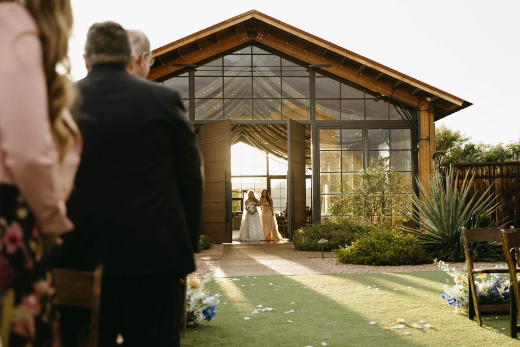 bride walking down the aisle paseo wedding ceremony