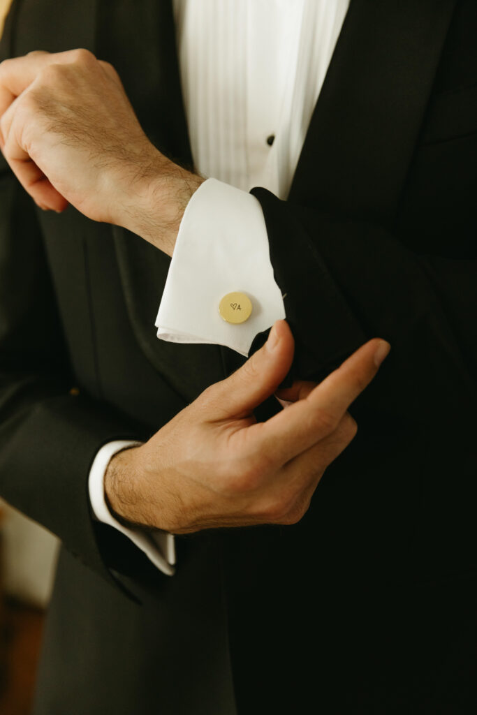 Groom getting ready in Arizona Airbnb