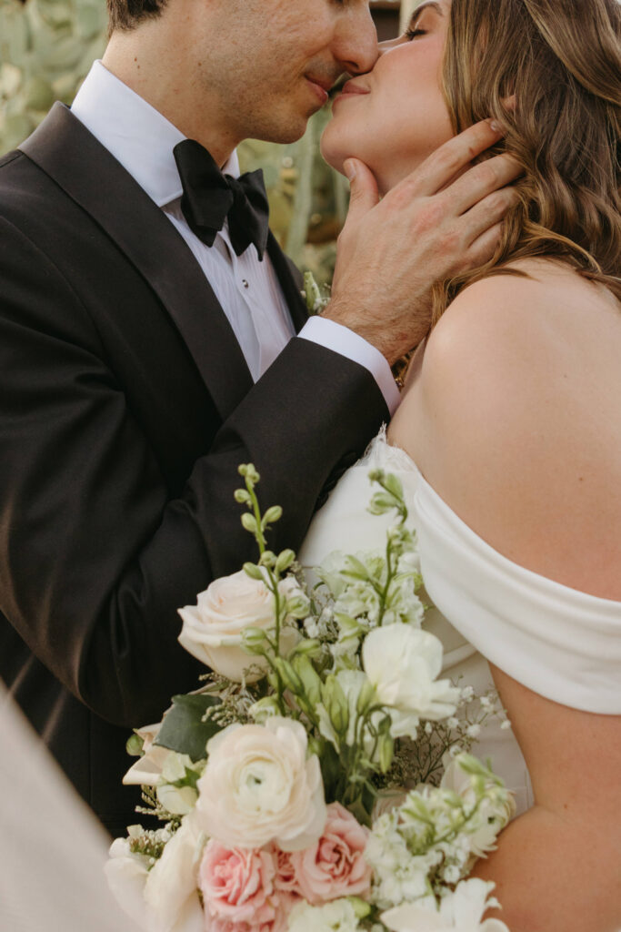 Newlyweds exploring the cactus gardens at Desert Botanical Garden after their ceremony