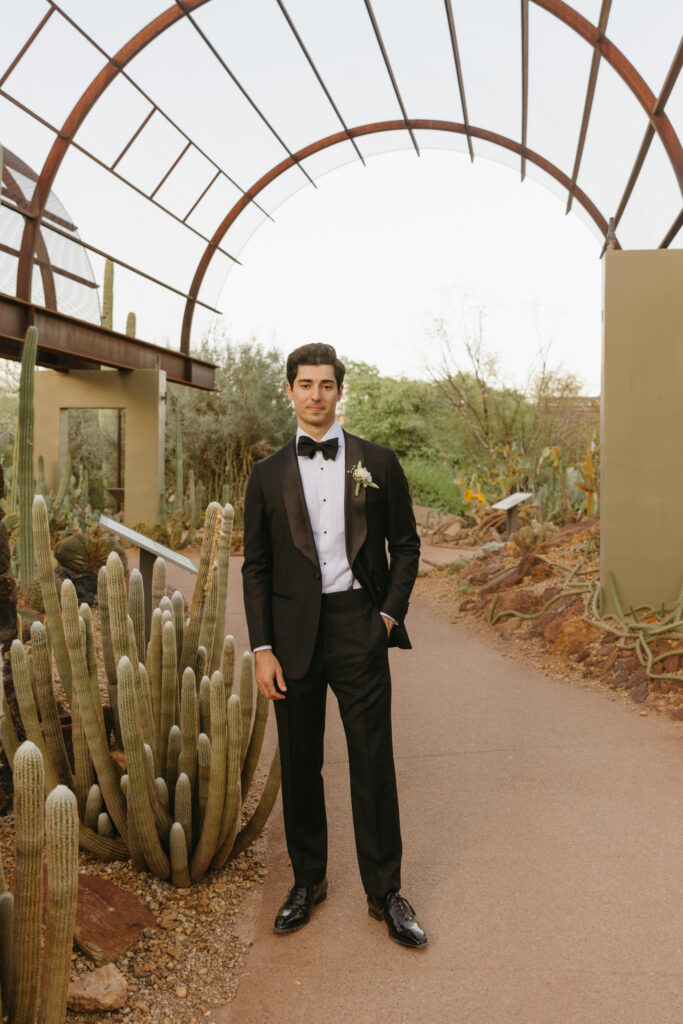 Newlyweds exploring the cactus gardens at Desert Botanical Garden after their ceremony