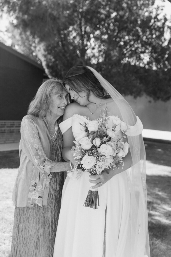 Bride sharing a moment with family before her wedding ceremony