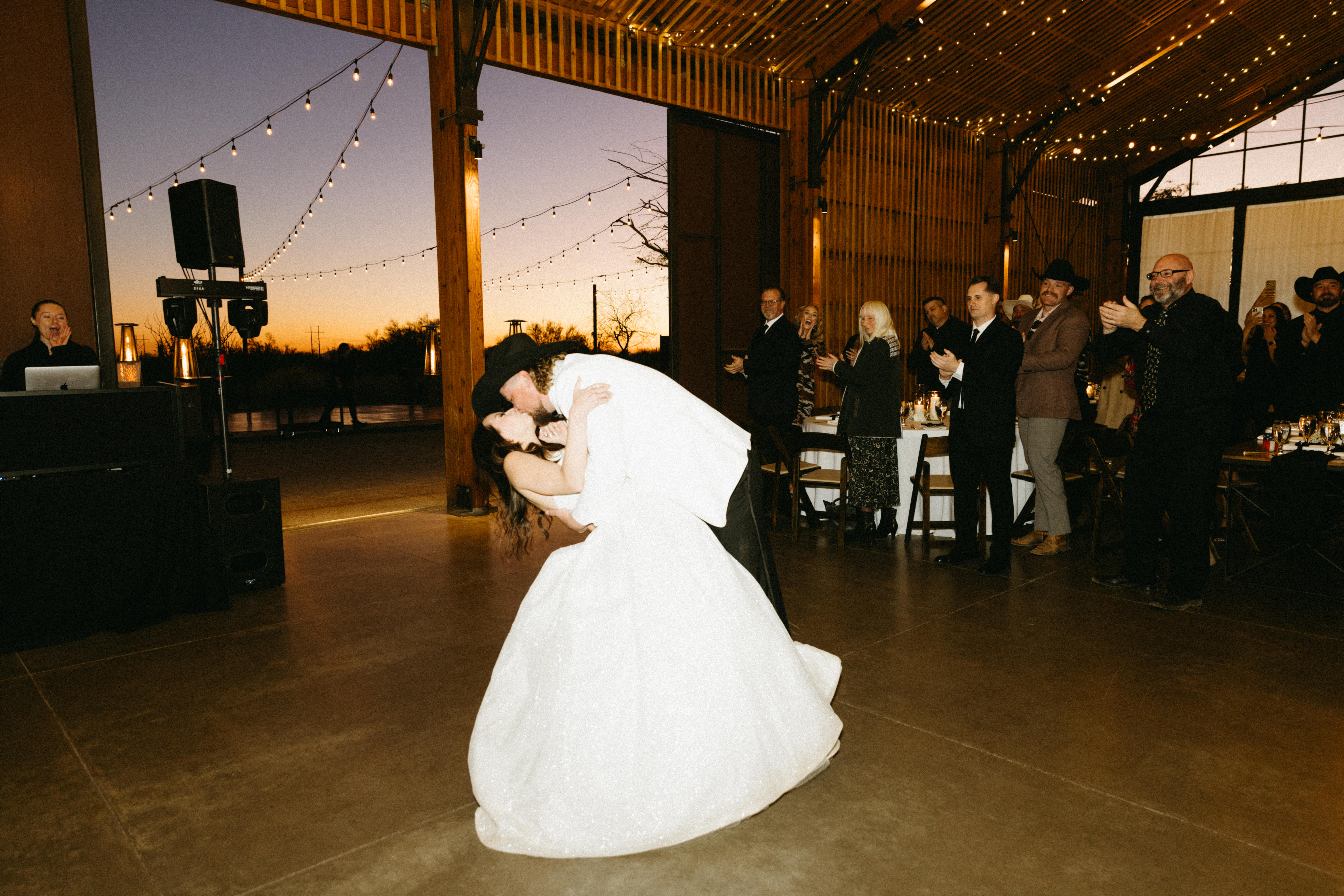 Bride and groom celebrating with family and friends at The Paseo.