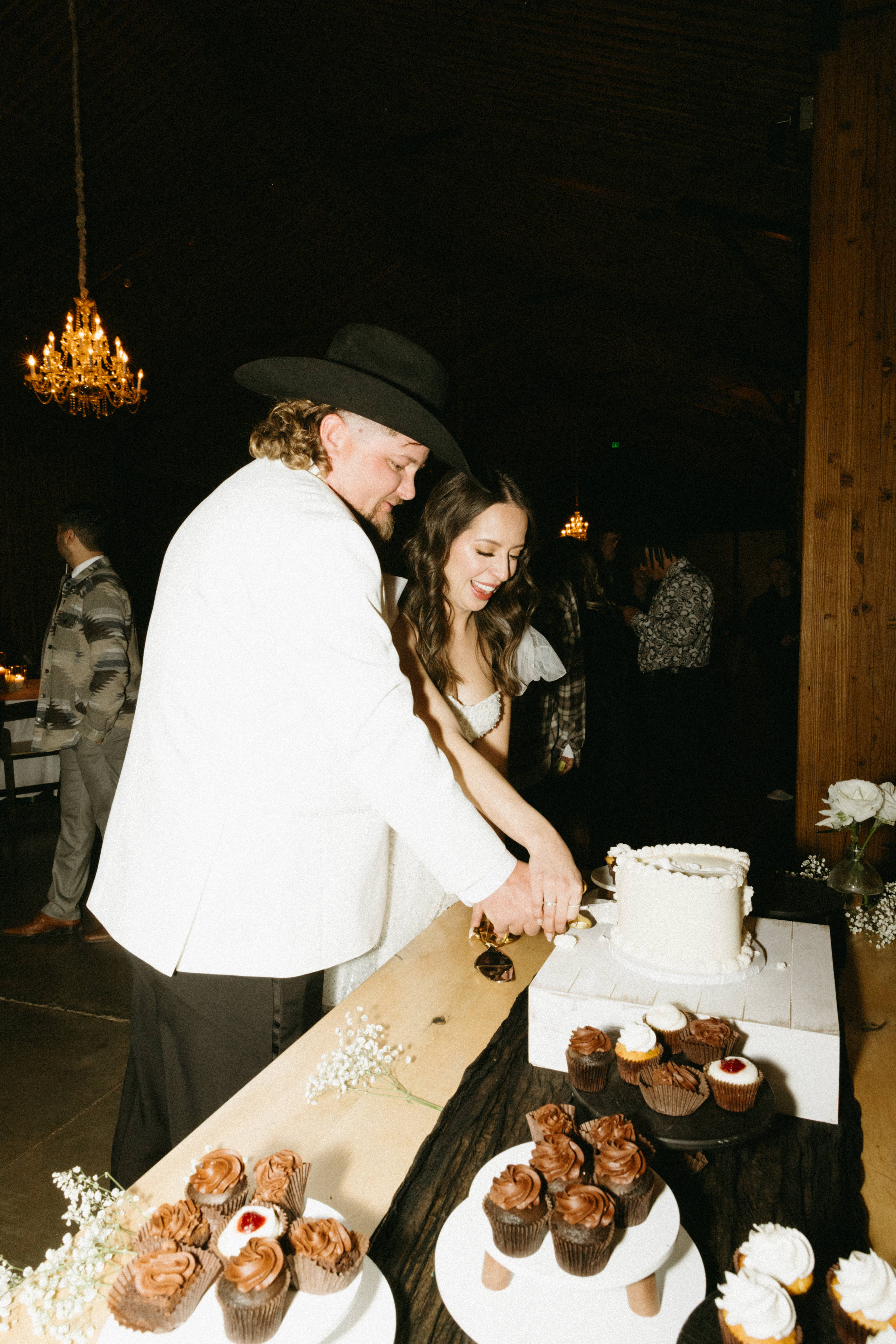 Bride and groom celebrating with family and friends at The Paseo.