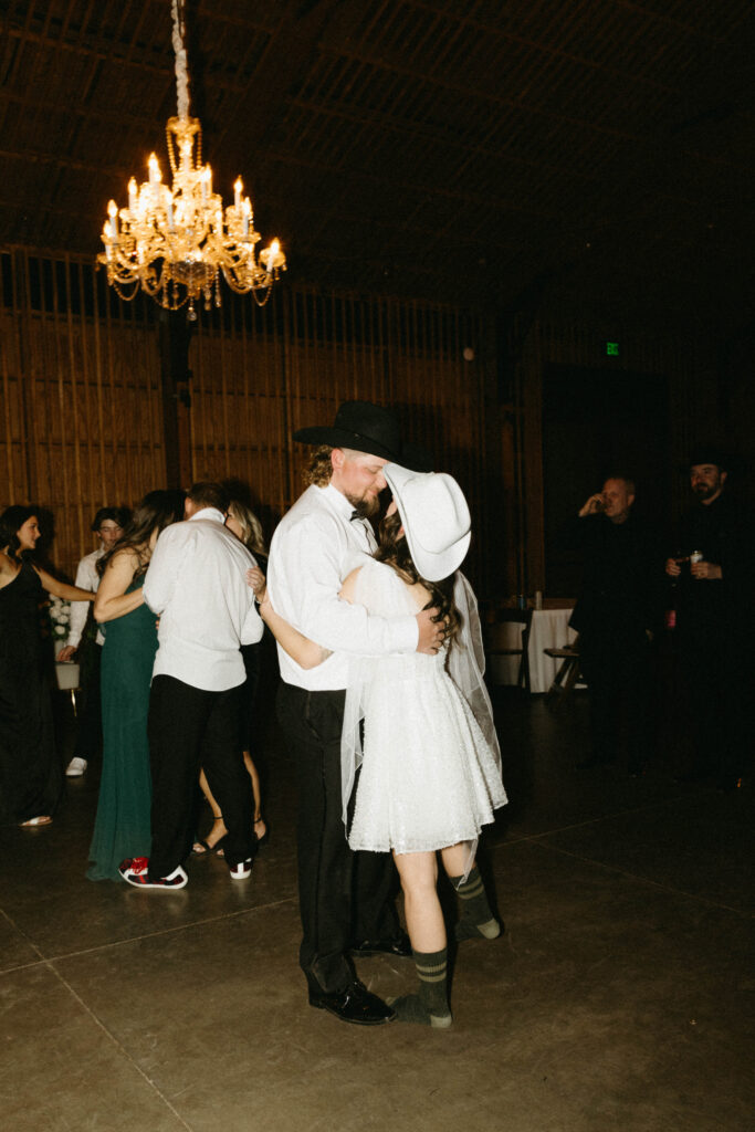 Bride and groom celebrating with family and friends at The Paseo.