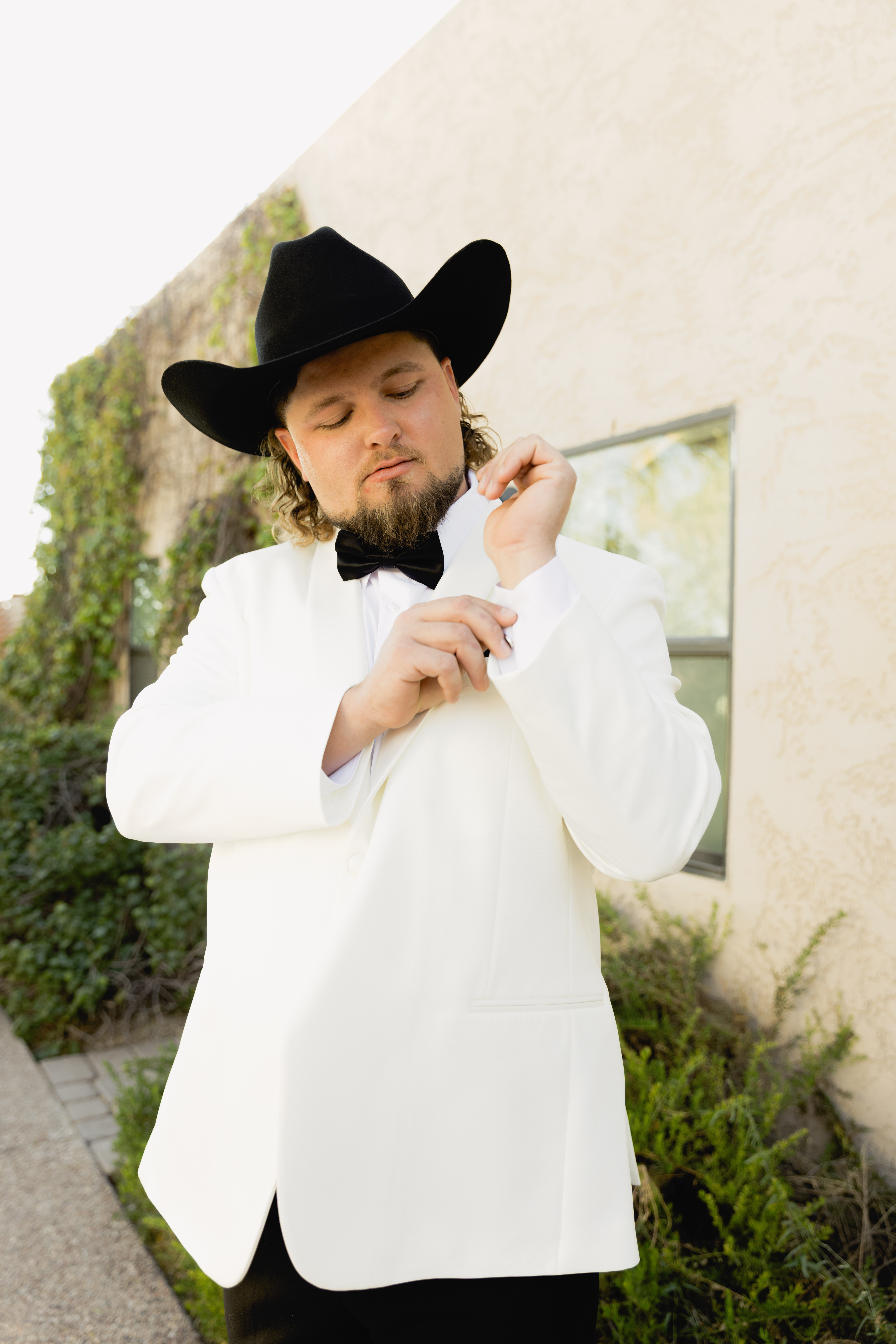 groom wedding photos in the desert