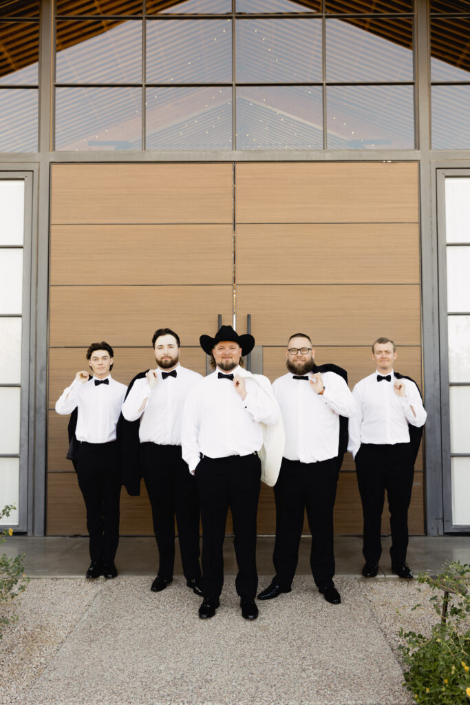 groom wedding photos in the desert