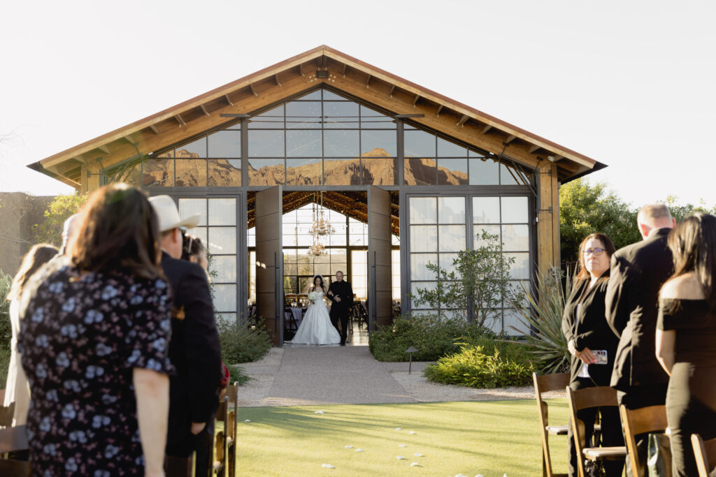 Outdoor wedding ceremony at The Paseo overlooking the Superstition Mountains