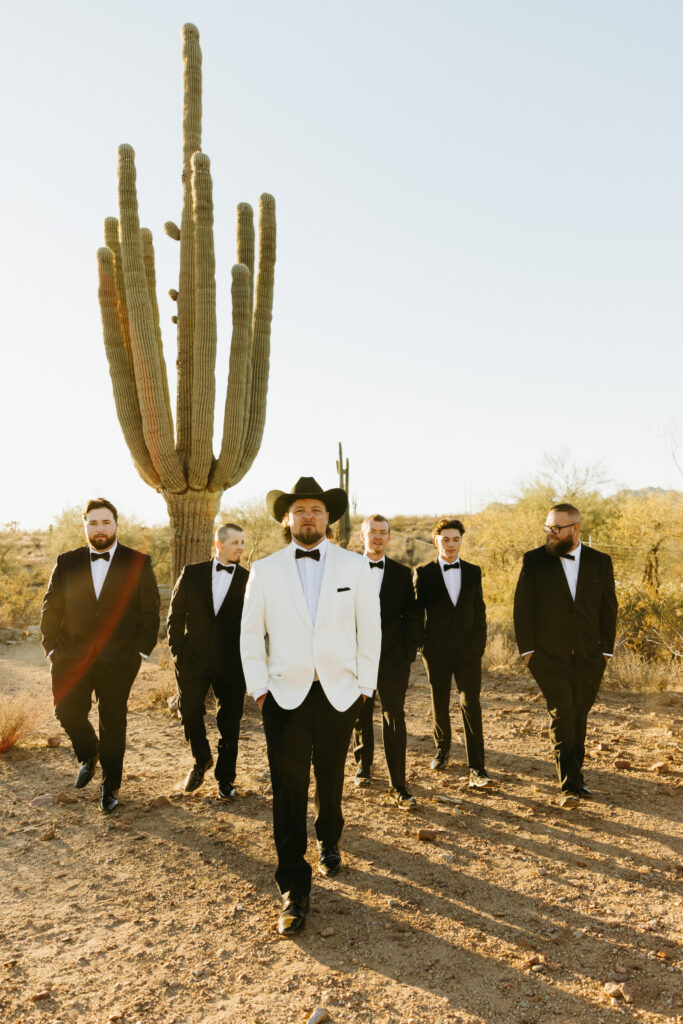 groom wedding photos in the desert
