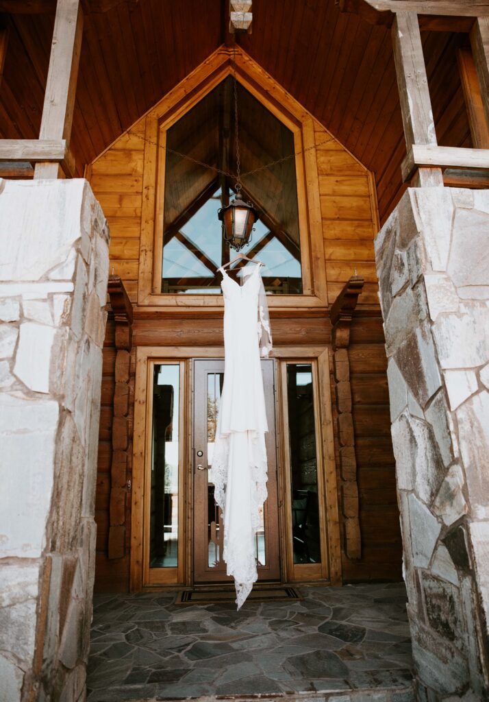 brides dress hanging at cabin in Payson