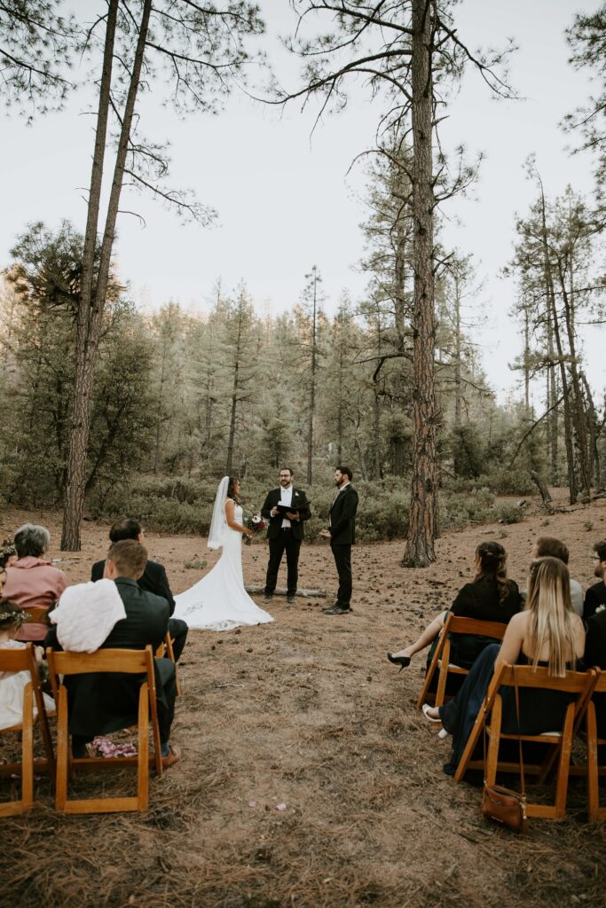 intimate Payson elopement ceremony surrounded by pine trees.