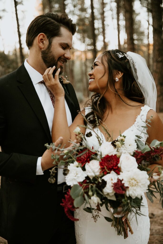 bride and groom portraits beneath the ponderosa pines in Payson, Arizona.