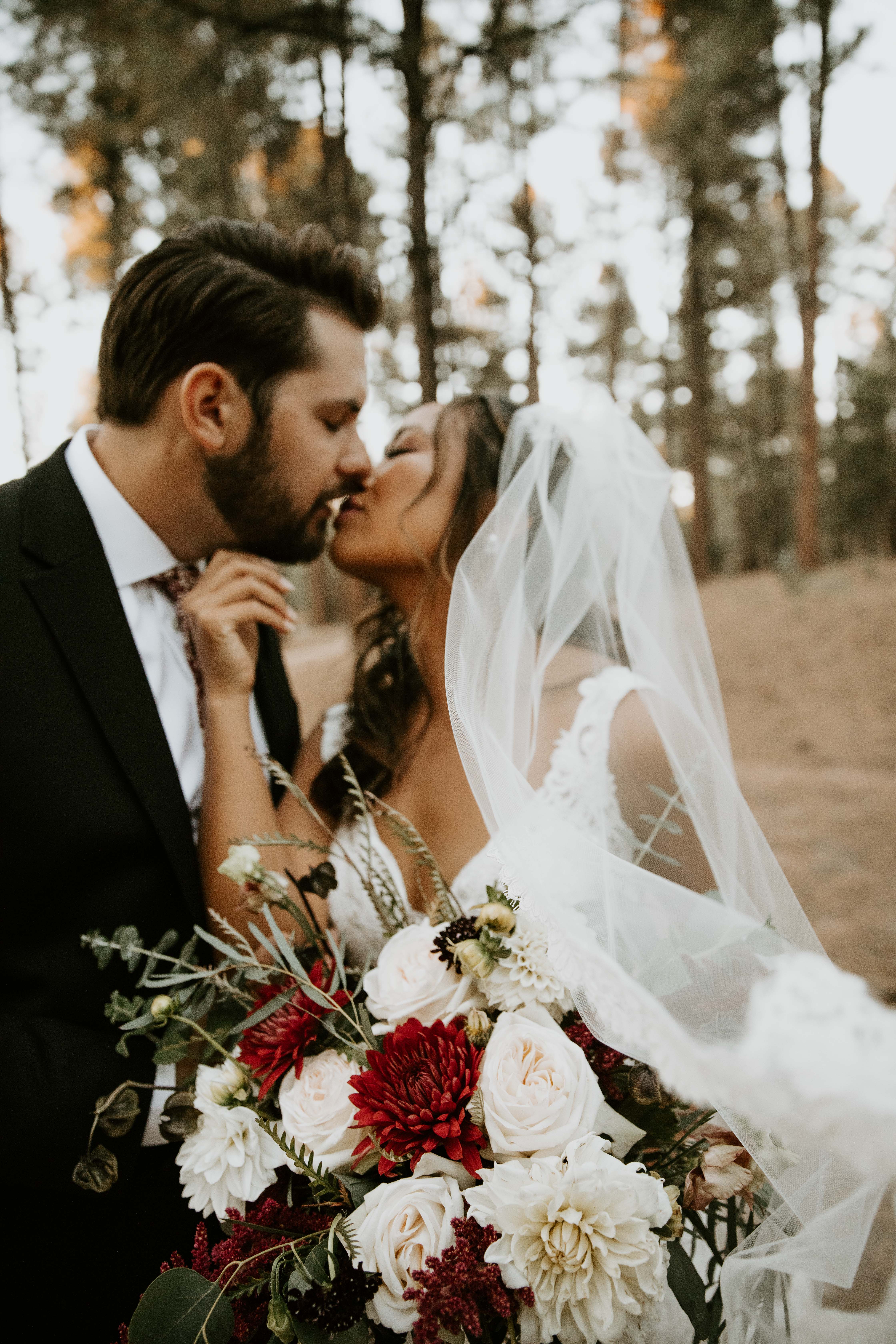 bride and groom portraits beneath the ponderosa pines in Payson, Arizona.