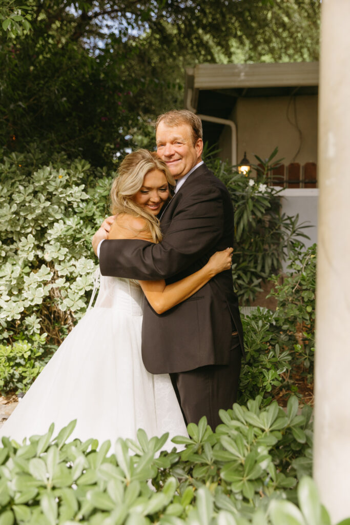 father and daughter first look at wedding