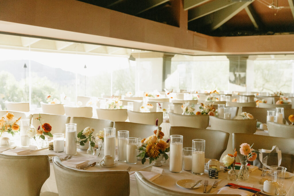 Reception tables decorated for a luxury wedding at Different Pointe of View.