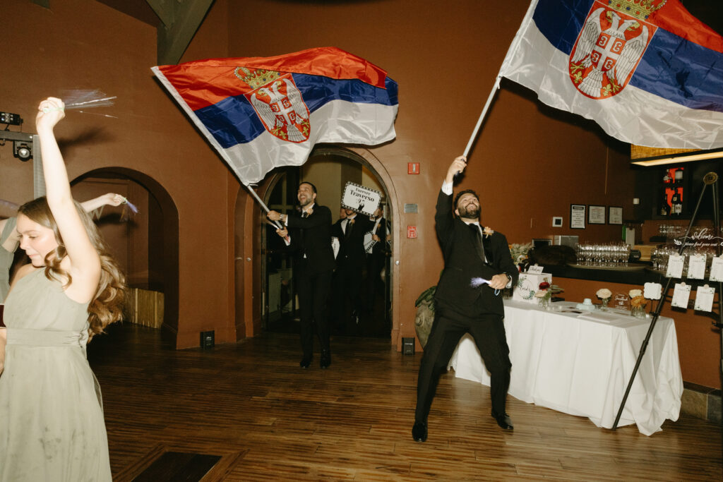 Wedding guests celebrating after the ceremony at Different Pointe of View.