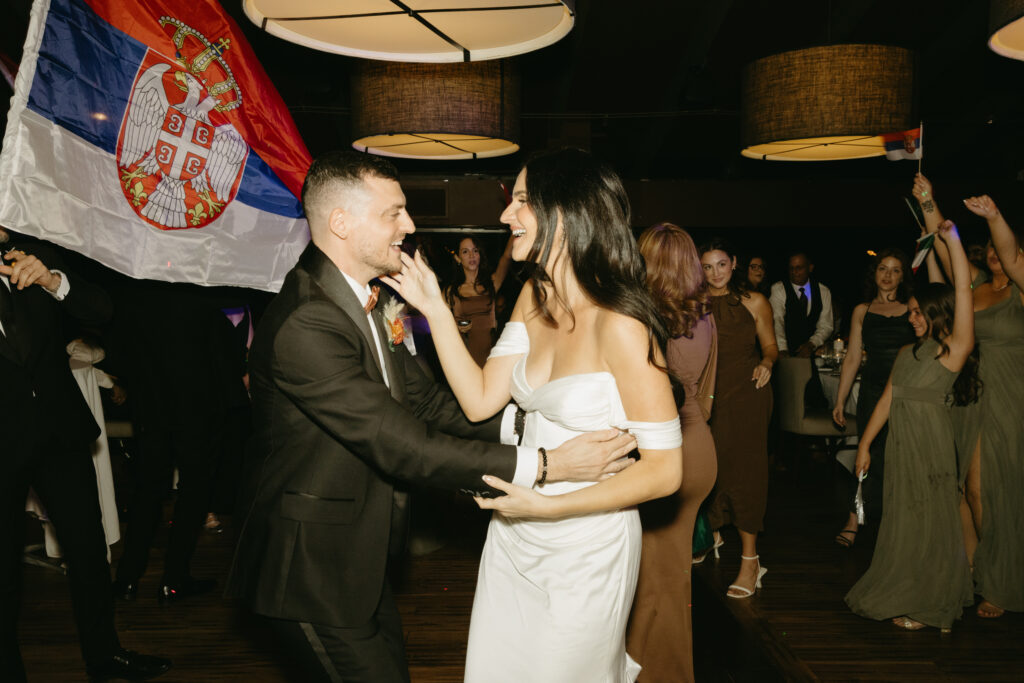 Wedding guests celebrating after the ceremony at Different Pointe of View.