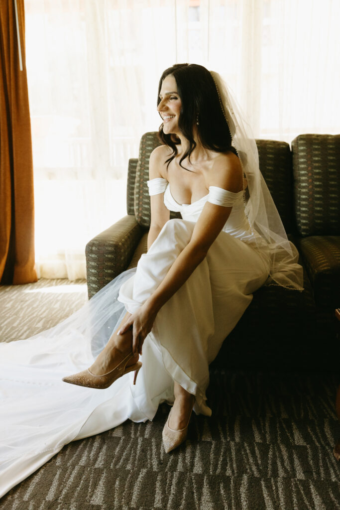 Bride getting ready at Hilton Phoenix Tapatio Cliffs Resort before her wedding ceremony.