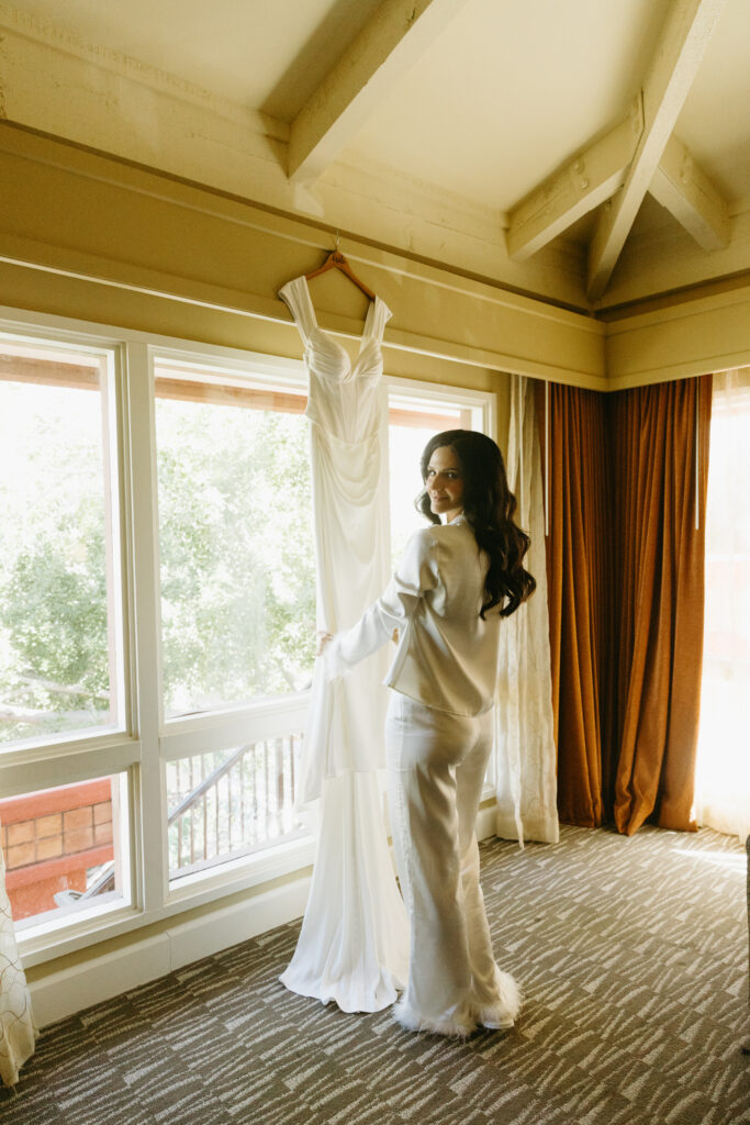 Bride getting ready at Hilton Phoenix Tapatio Cliffs Resort before her wedding ceremony.