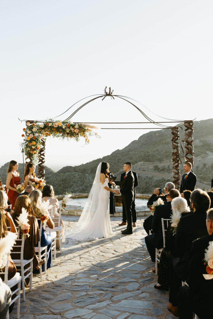 Outdoor wedding ceremony overlooking the Phoenix mountains at Different Pointe of View.