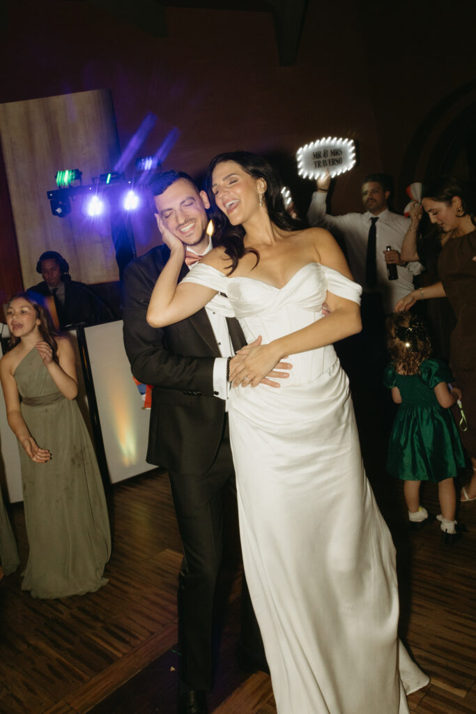 Wedding guests celebrating after the ceremony at Different Pointe of View.