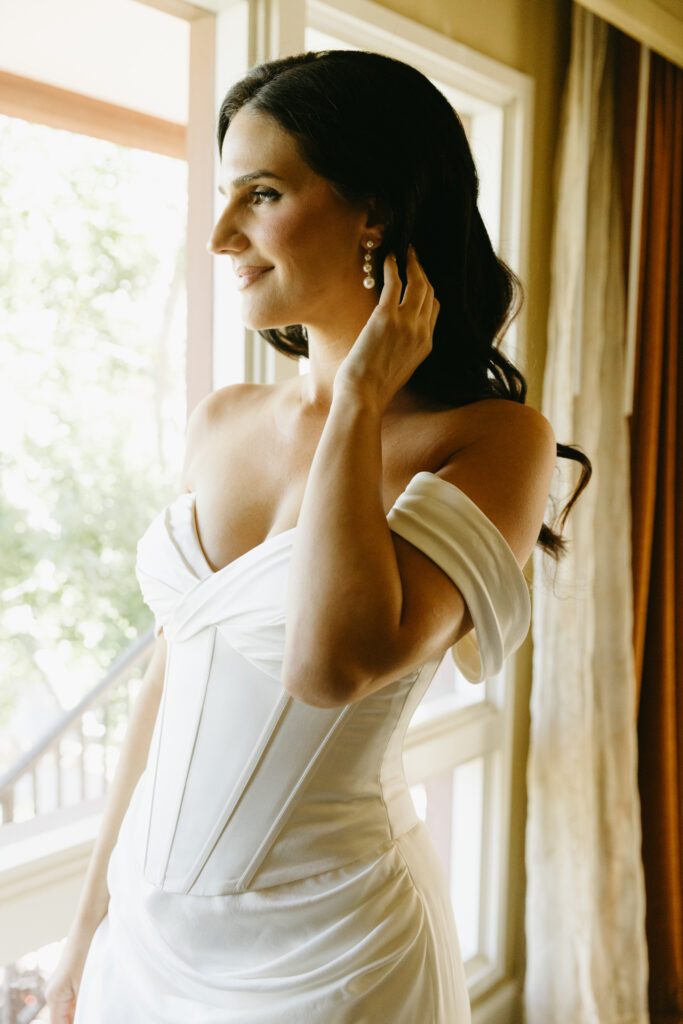 Bride getting ready at Hilton Phoenix Tapatio Cliffs Resort before her wedding ceremony.